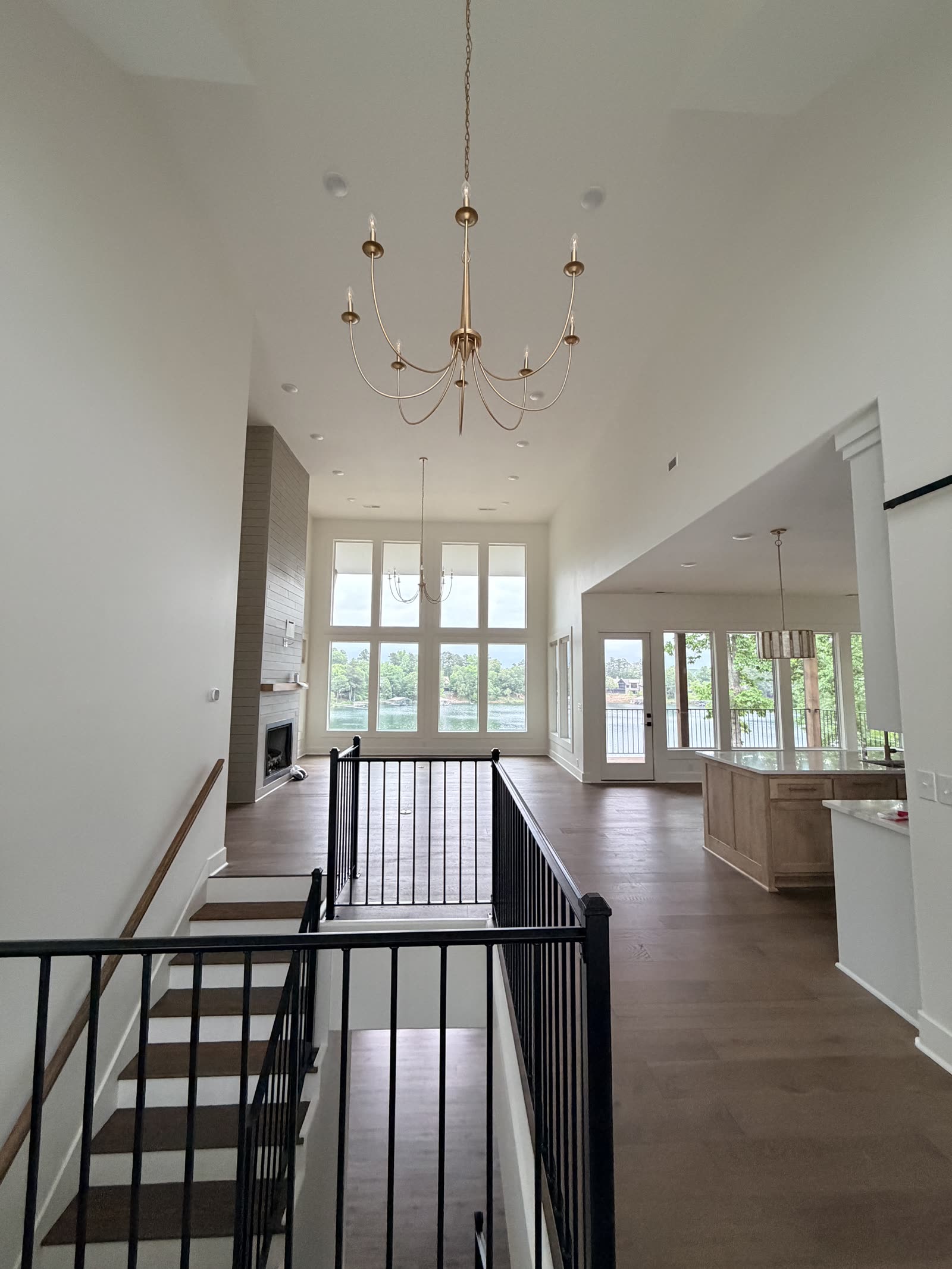 Living room and kitchen at Boardwalk Bliss, looking out to the lake