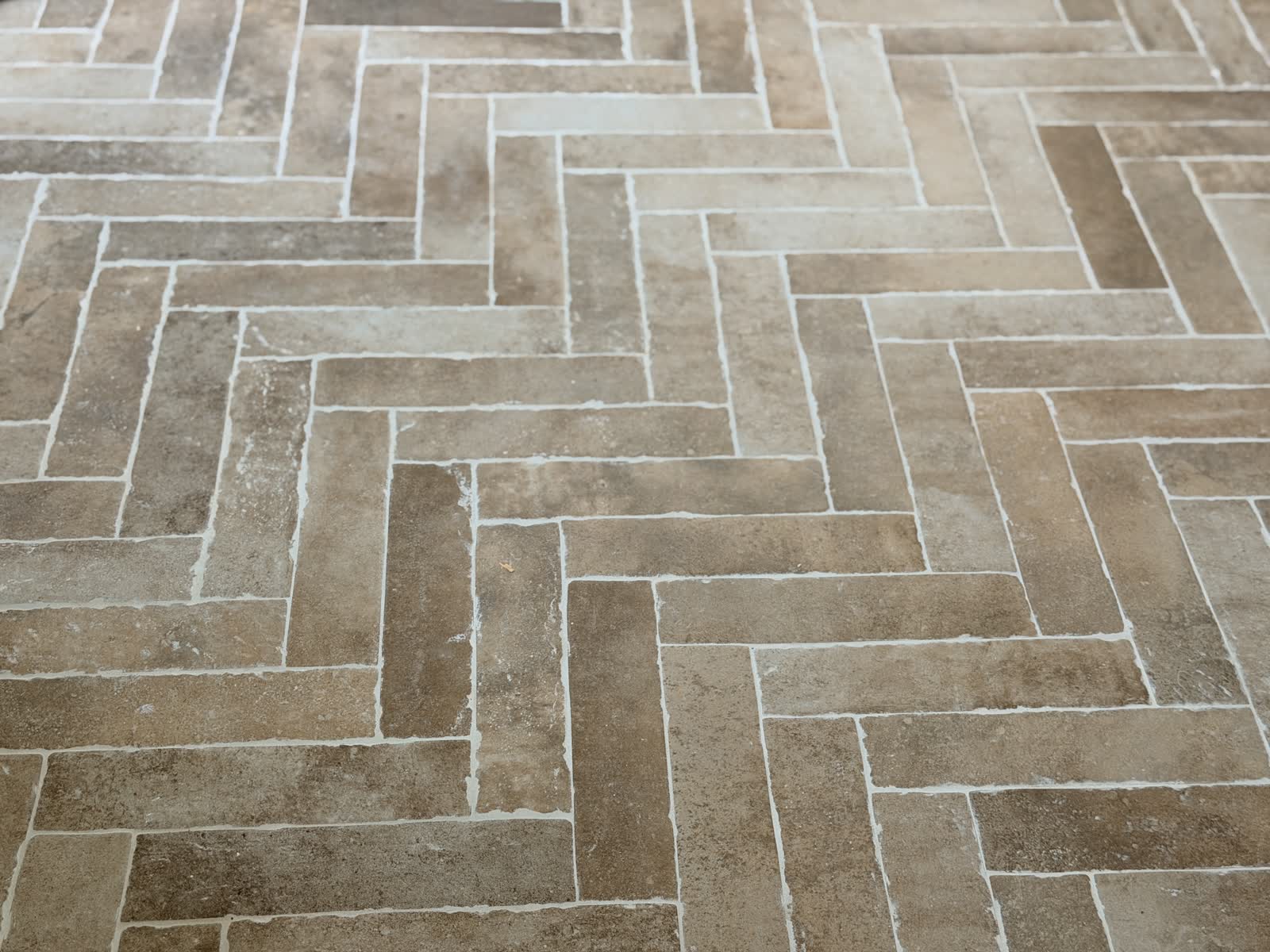 Herringbone tile at Boardwalk Bliss