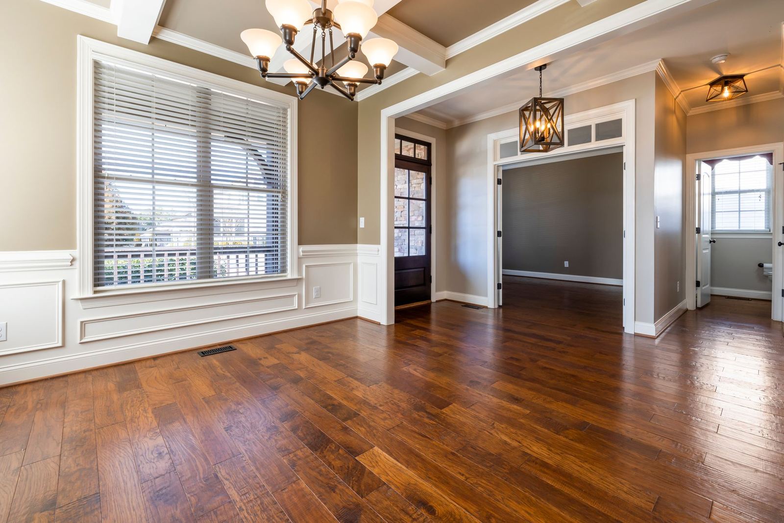 Room with rich hardwood flooring
